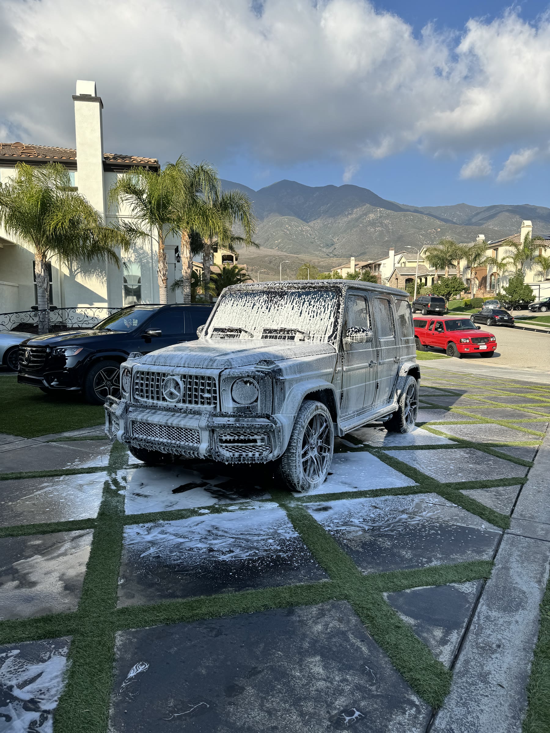 Black Mercedes-AMG G63 mid foam wash detail